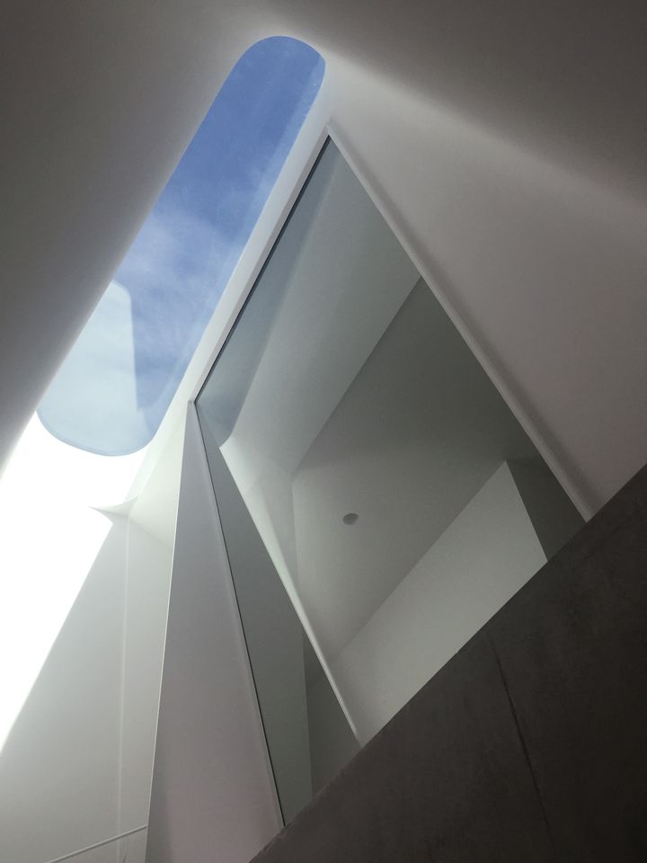  Sculptural concrete beachfront house located in Tamarama along the Bondi to Coogee walk designed by Durbach Block Jaggers Architects.