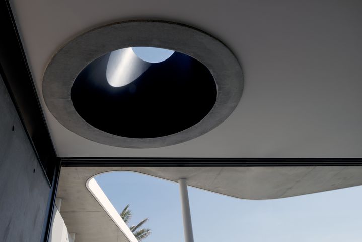  Sculptural concrete beachfront house located in Tamarama along the Bondi to Coogee walk designed by Durbach Block Jaggers Architects.