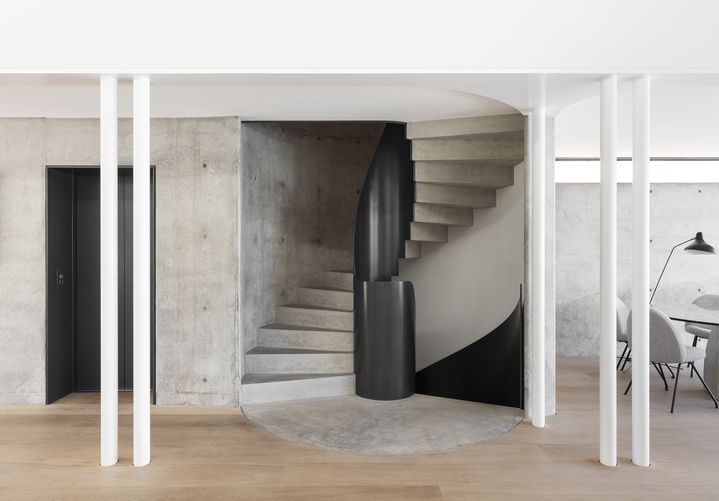  Sculptural concrete beachfront house located in Tamarama along the Bondi to Coogee walk designed by Durbach Block Jaggers Architects.