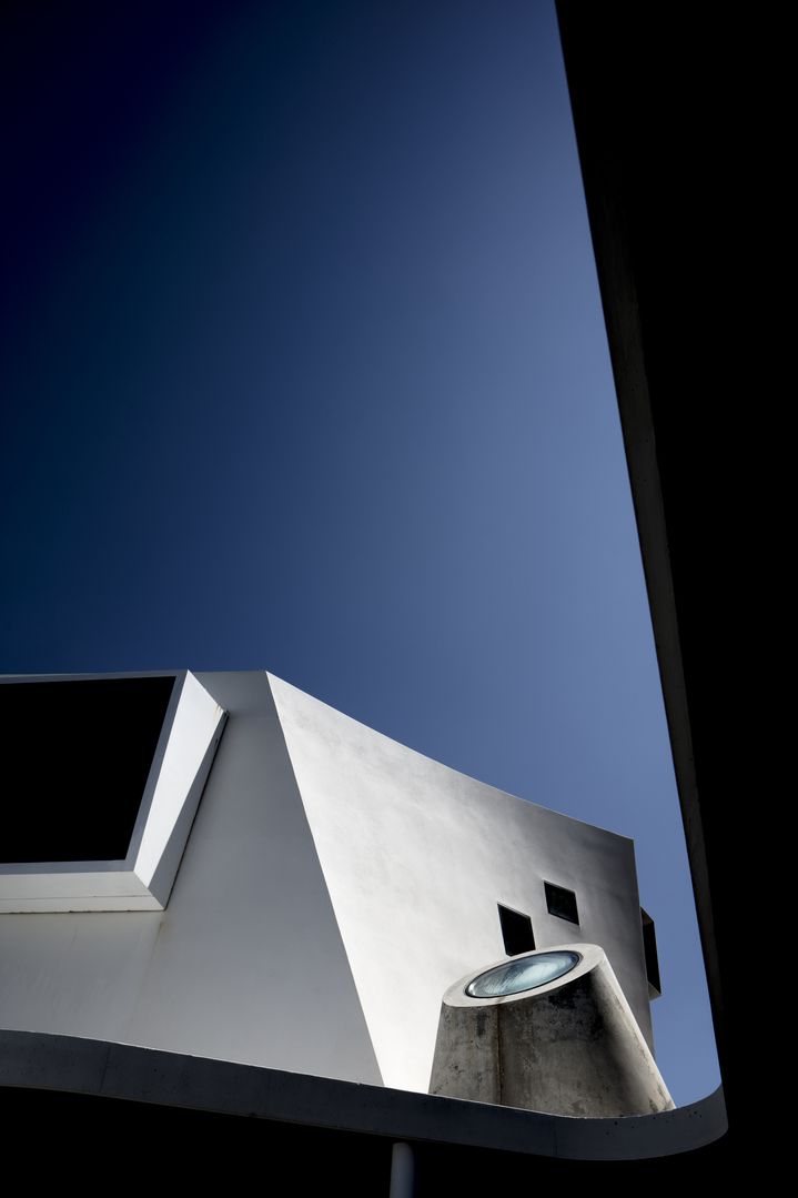  Sculptural concrete beachfront house located in Tamarama along the Bondi to Coogee walk designed by Durbach Block Jaggers Architects.