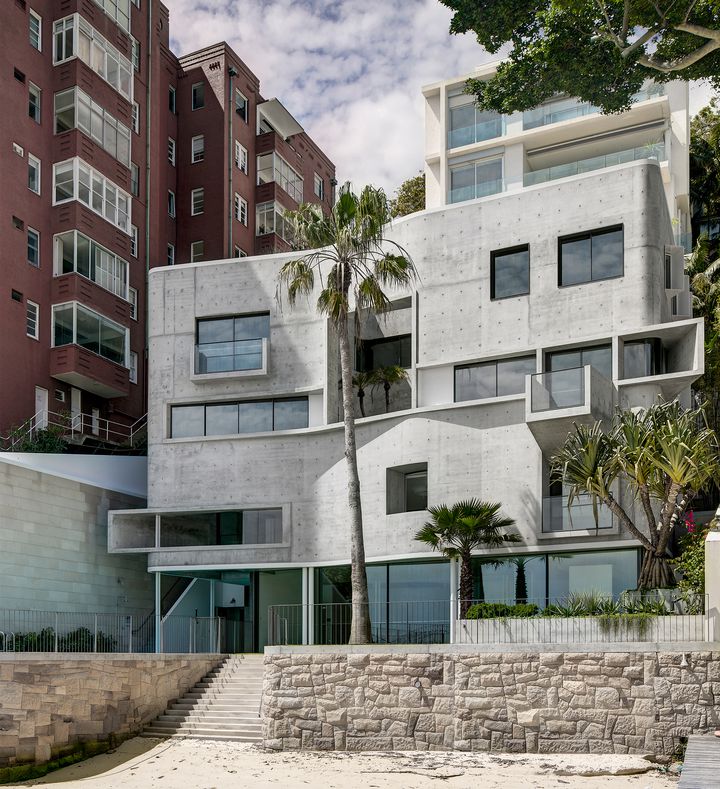  Raw sculptural concrete brutalist house on located on the Sydney harbour front in Point Piper designed by Durbach Block Jaggers Architects.